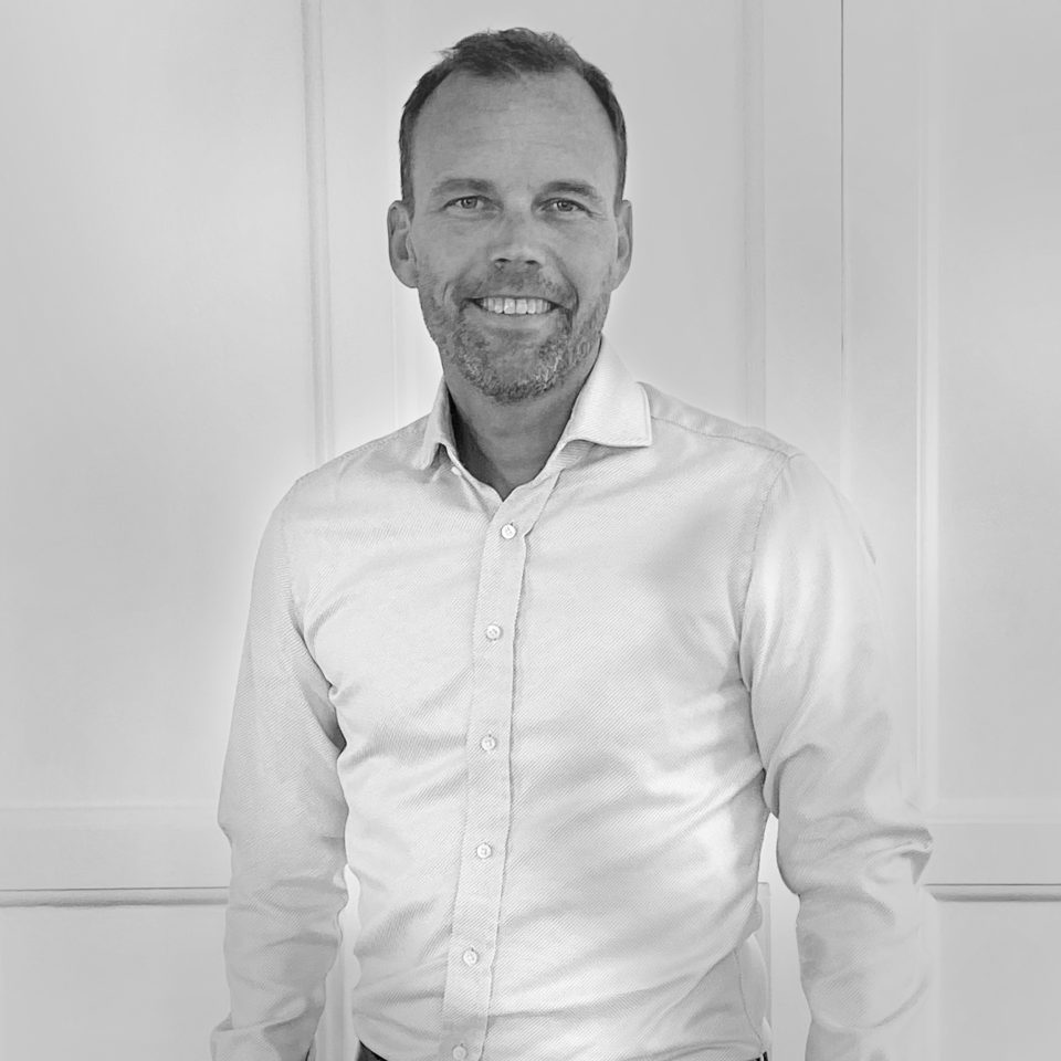 Johan Kvist, Partner at Influence, a Newground Company, standing in an office setting