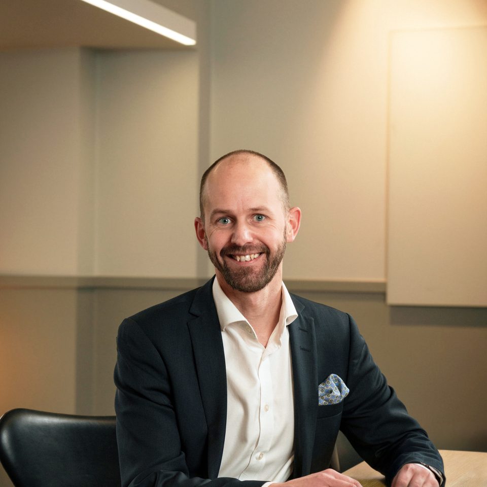 Martin Sund, partner at Procure it Right, a Newground company, sitting in an office setting