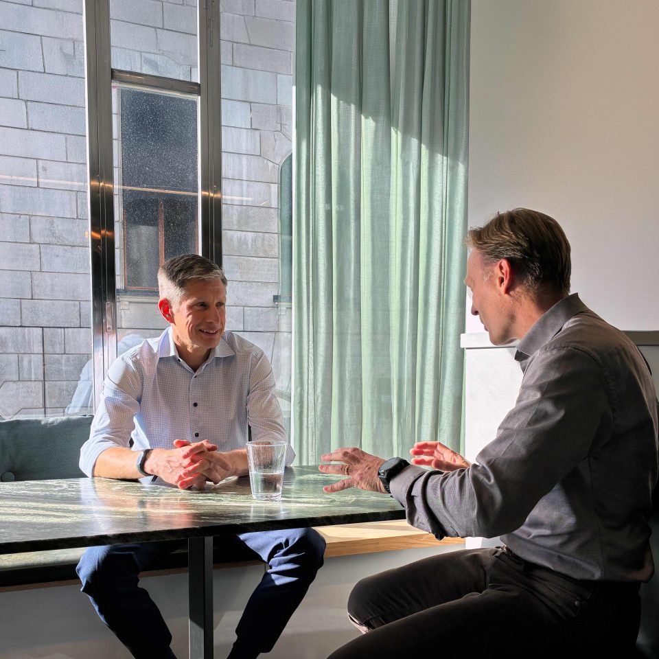 Joel Russ, Partner at Adelis Equity and Per Appelgren, Managing partner and co-founder at Newground sitting in a ktichen setting.